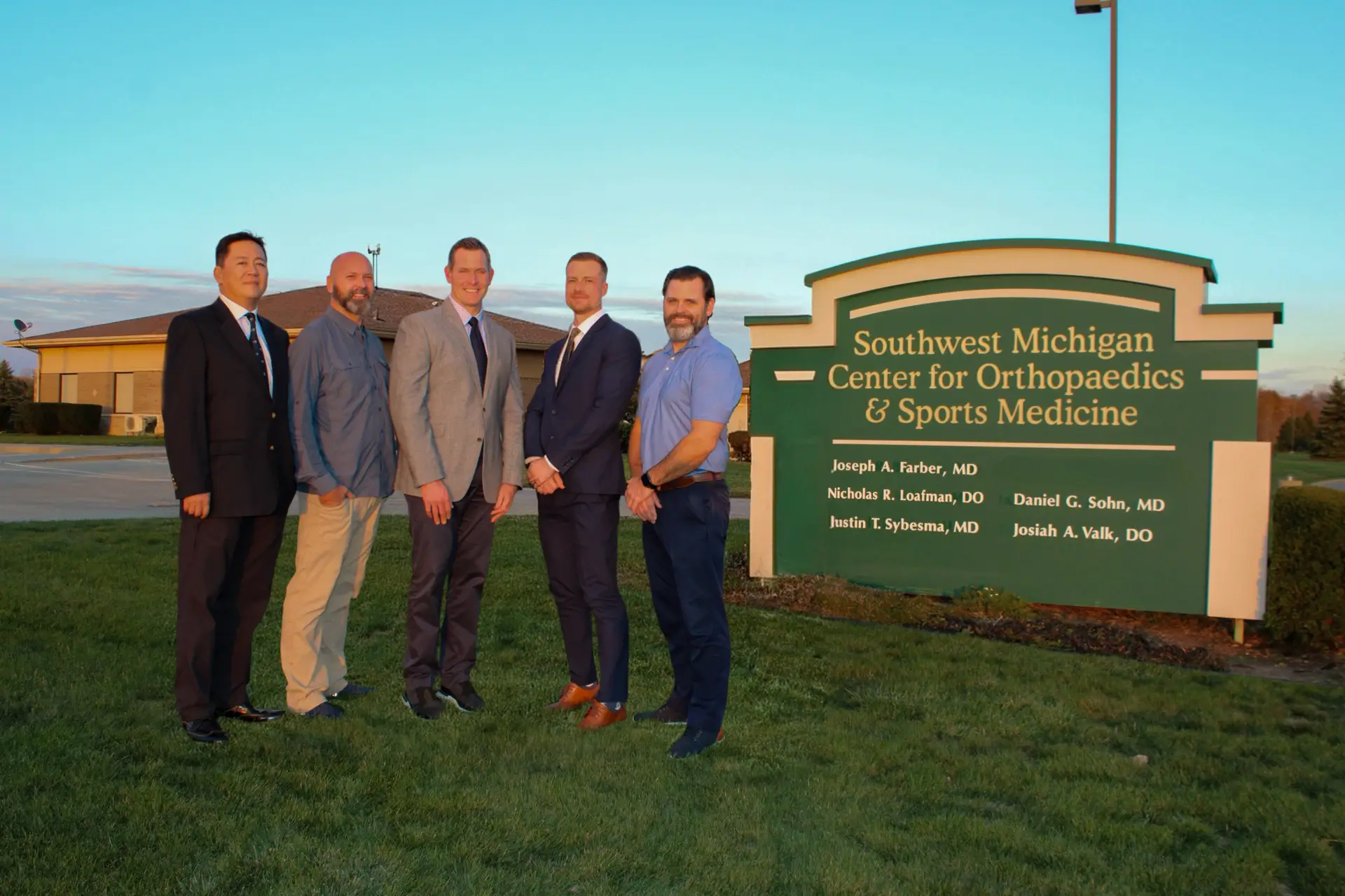 New Exterior Photo without Kutzner 4 New Team without Kutzner and building FINAL